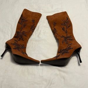Suede boots with beaded design.
